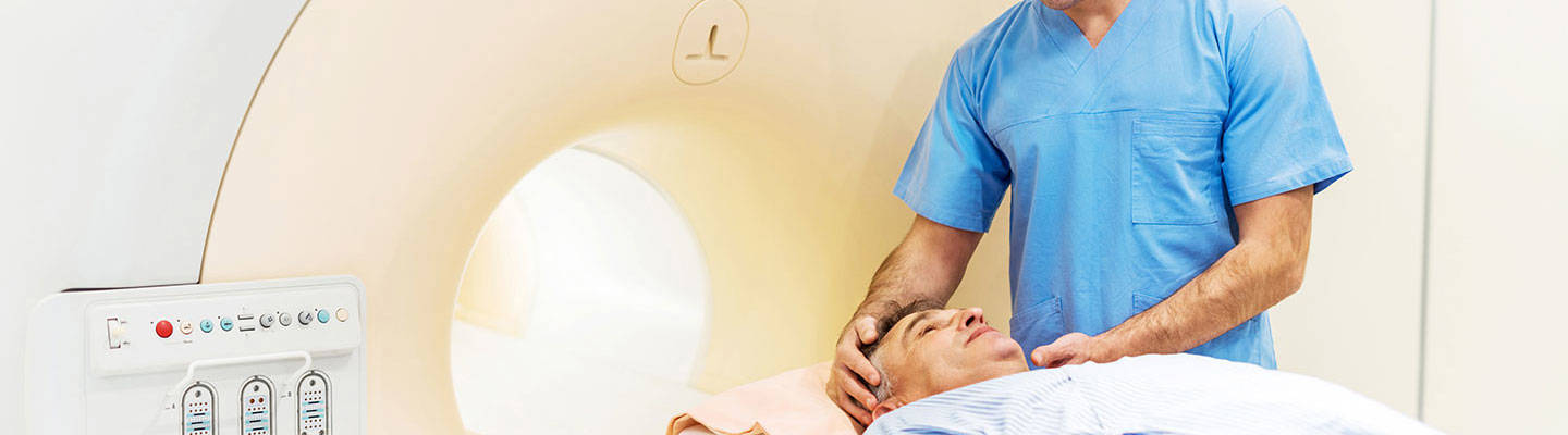 Male patient getting a cat scan