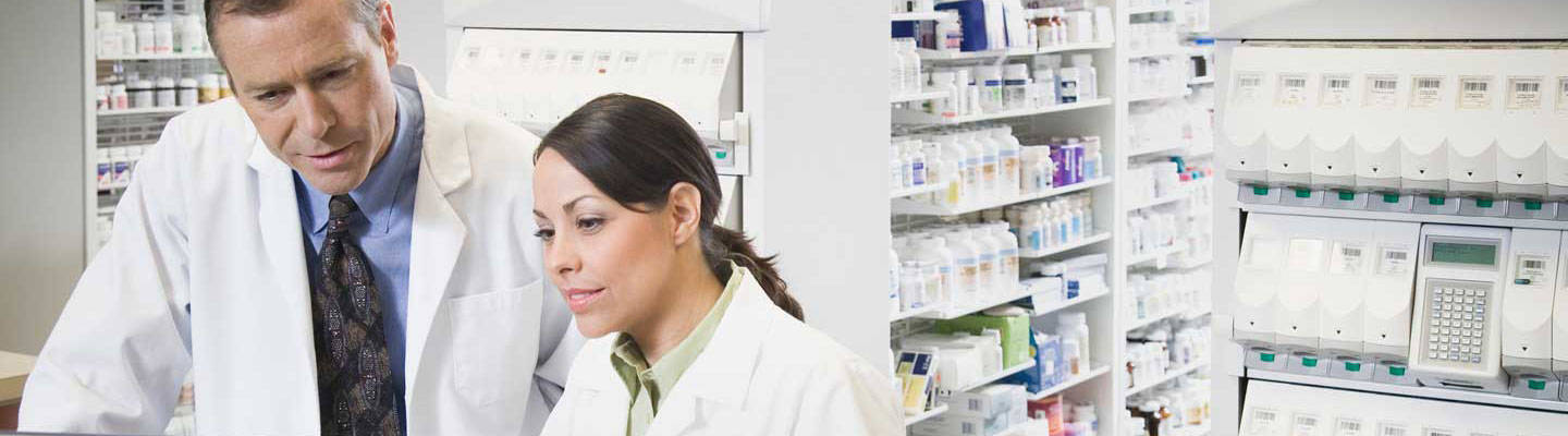 2 Pharmacists looking at computer